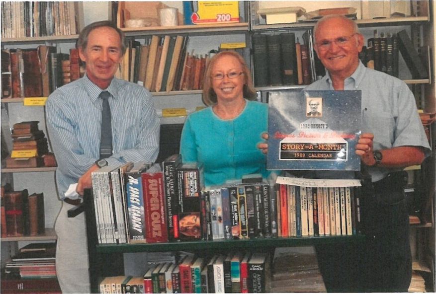 Carlos Patterson, Stewart Plein, and John Cuthbert pose with Asimov donation.